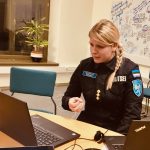 Webpolice sitting behind the computer